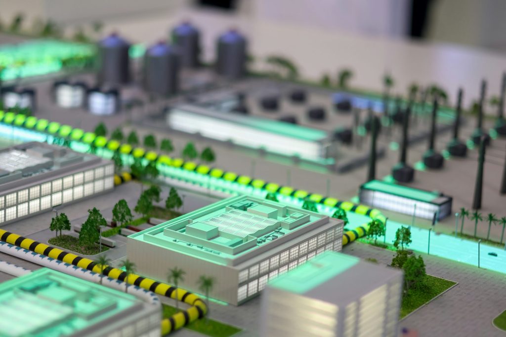 Complejo industrial en miniatura con luces brillantes